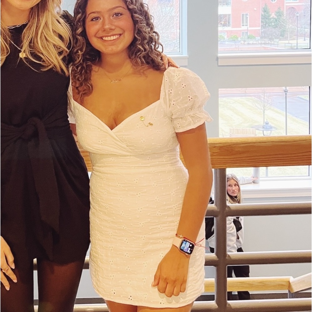 White mini dress with puffy sleeve
